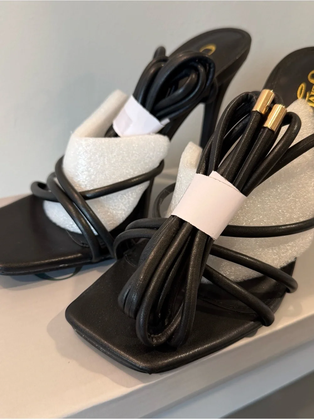 Elegant Black Strappy High Heel Mules with Gold Accent
